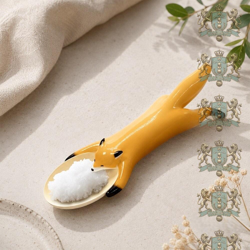 Fox Laying Holding Bowl Design Spoon